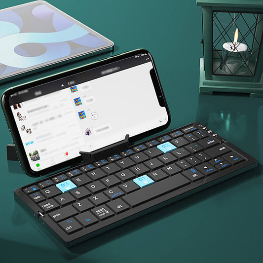 💻 Bärbar Mini Hopfällbar Tangentbord - Perfekt för Telefon, Surfplatta och Laptop 🌟