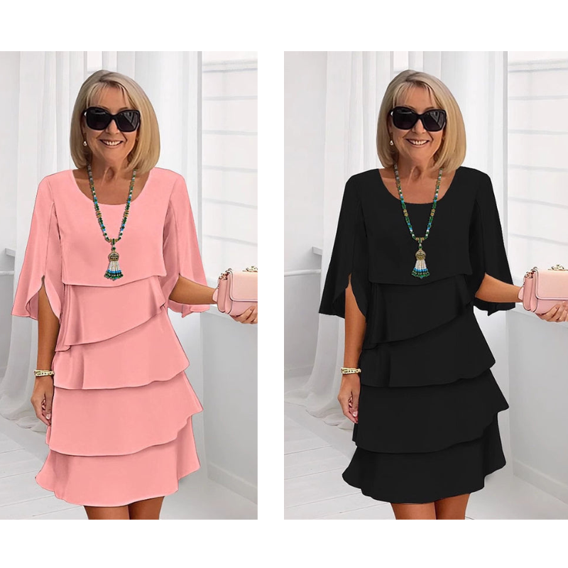 Elegant klänning med lager på lager och volangärmar för kvinnor