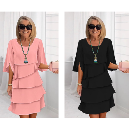 Elegant klänning med lager på lager och volangärmar för kvinnor