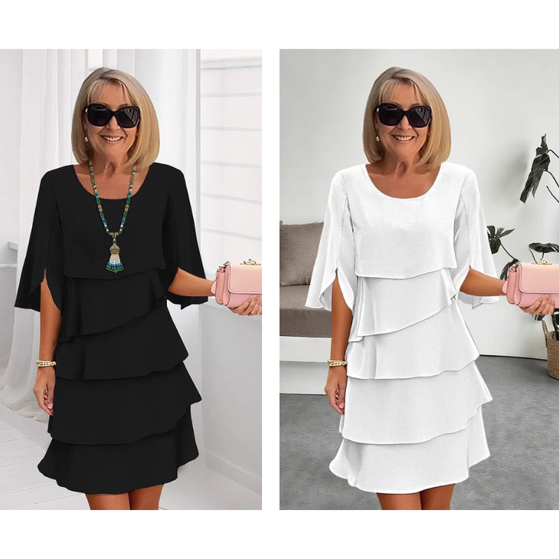 Elegant klänning med lager på lager och volangärmar för kvinnor