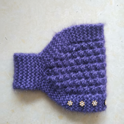 Stickat pannband för kvinnor med blommiga detaljer