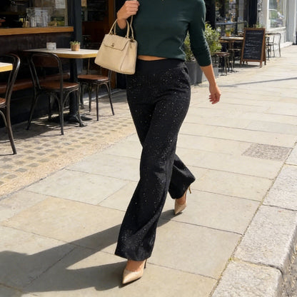 Högmidjade glitterbyxor med raka ben
