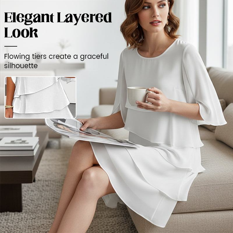 Elegant klänning med lager på lager och volangärmar för kvinnor