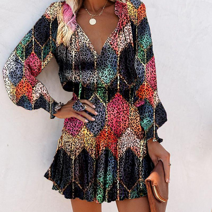 Köp två artiklar och få gratis leverans - Damklänning med V-ringning, långa ärmar och volangkant