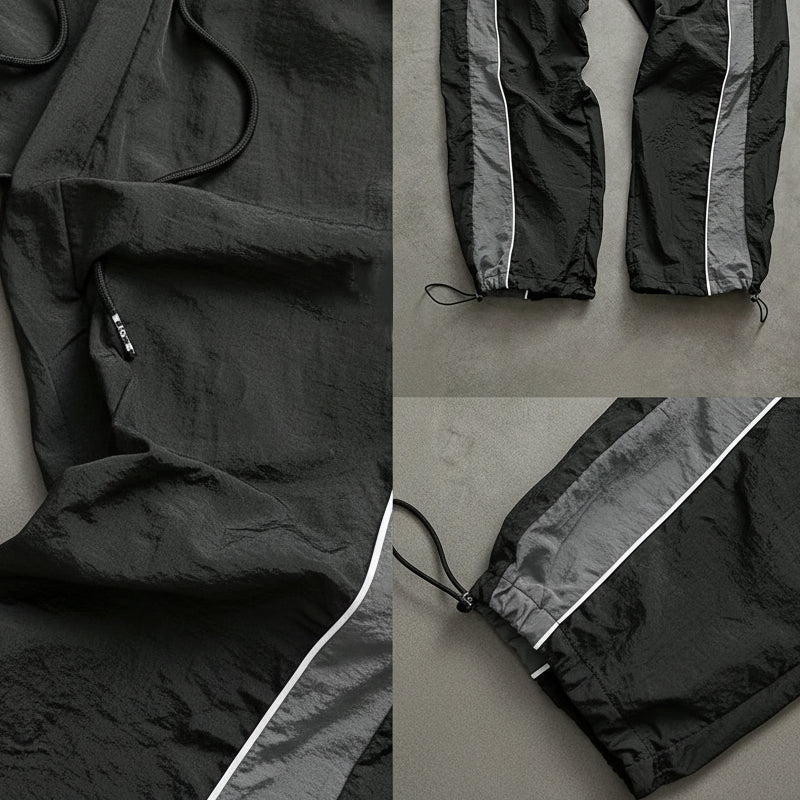 Snabborkande träningsbyxor för herr med sidoränder