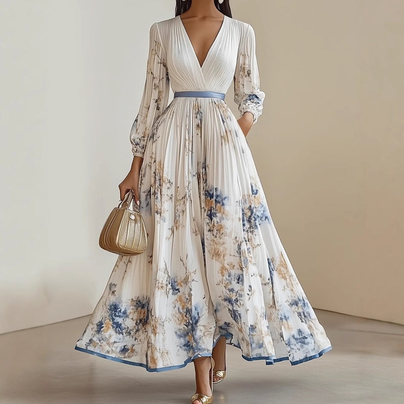 Elegant maxiklänning med V-ringning och blommönste