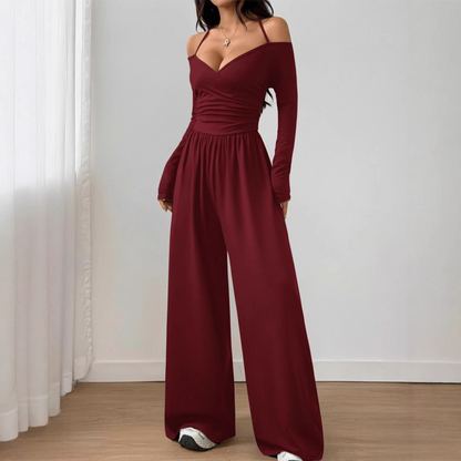 Jumpsuit med bar axlar, halterneck och vida be