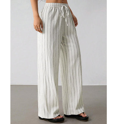 Randiga byxor med dragsko och vida ben för dame