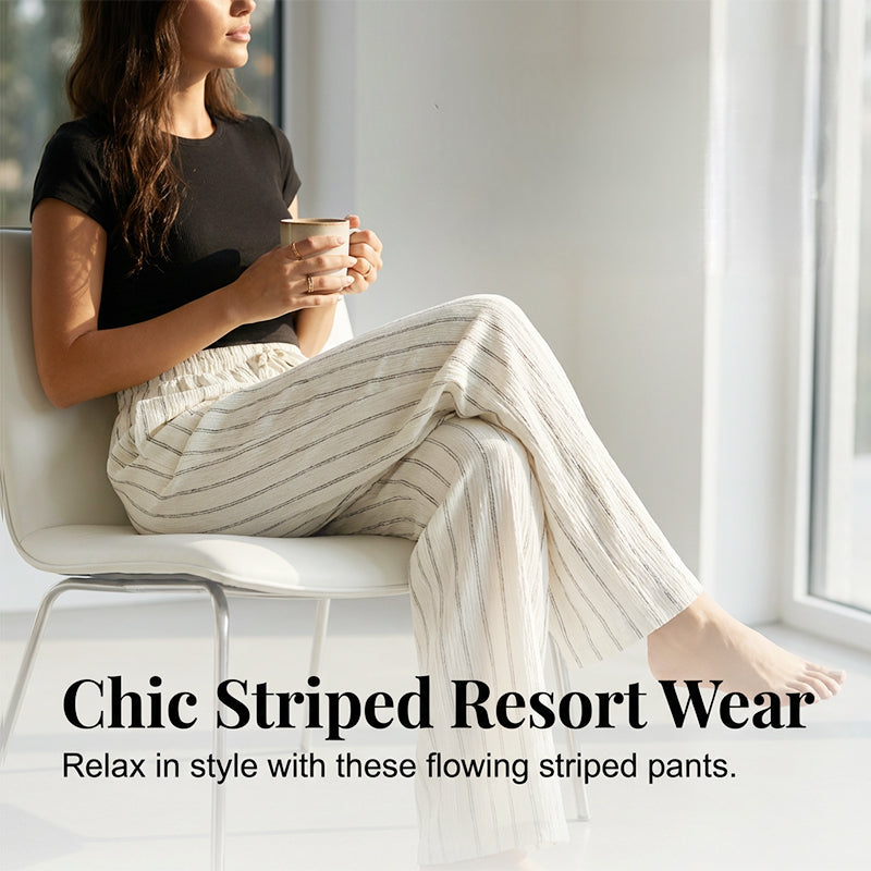 Randiga byxor med dragsko och vida ben för dame