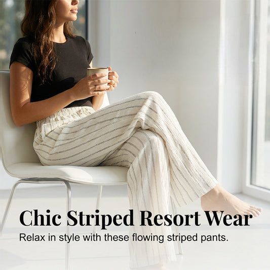 Randiga byxor med dragsko och vida ben för dame