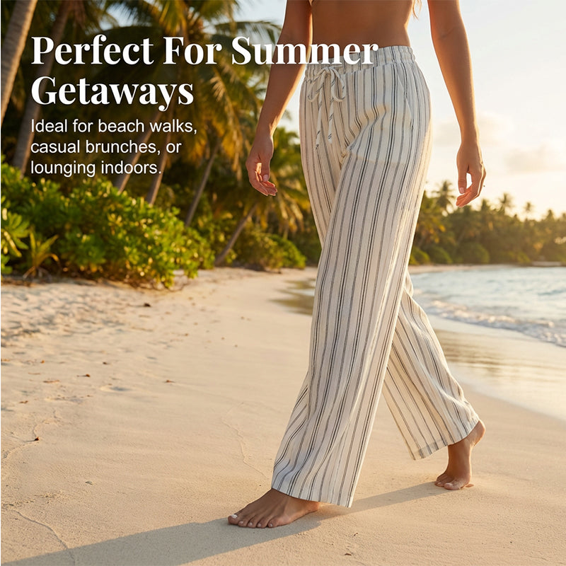 Randiga byxor med dragsko och vida ben för dame