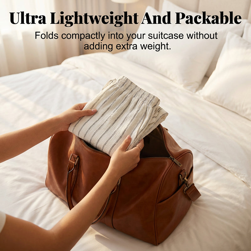 Randiga byxor med dragsko och vida ben för dame