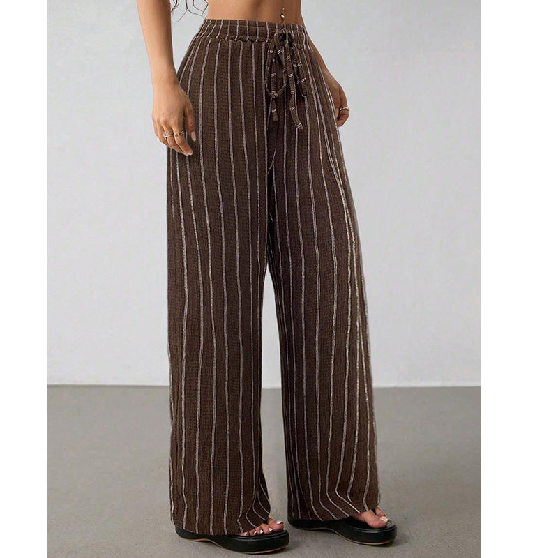 Randiga byxor med dragsko och vida ben för dame