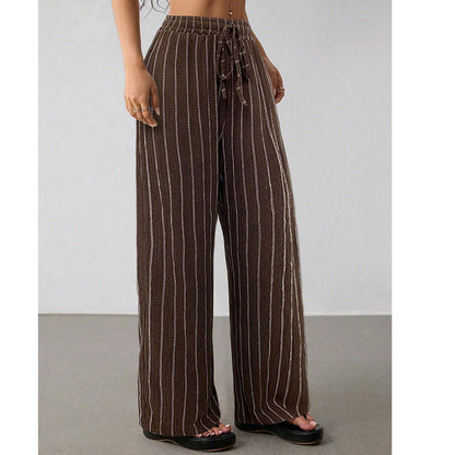 Randiga byxor med dragsko och vida ben för dame