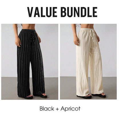 Randiga byxor med dragsko och vida ben för dame