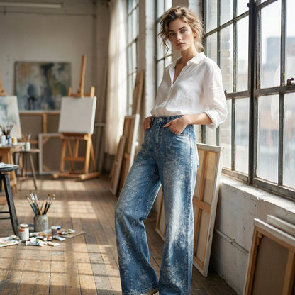 Dambyxor i denim med breda ben och blommönstrad jacquar