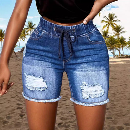 Damshorts i slitna jeans med dragsko och resår i midja