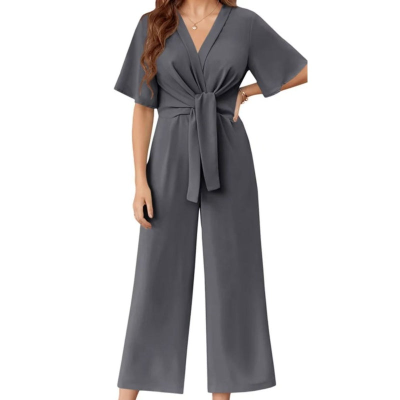 Elegant jumpsuit för dam med V-ringning, vida ben och knytning i midjan