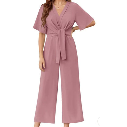 Elegant jumpsuit för dam med V-ringning, vida ben och knytning i midjan