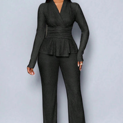 2-delat set med peplum-top och byxor för dam