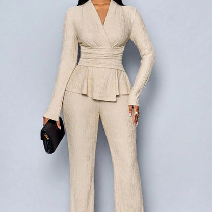 2-delat set med peplum-top och byxor för dam