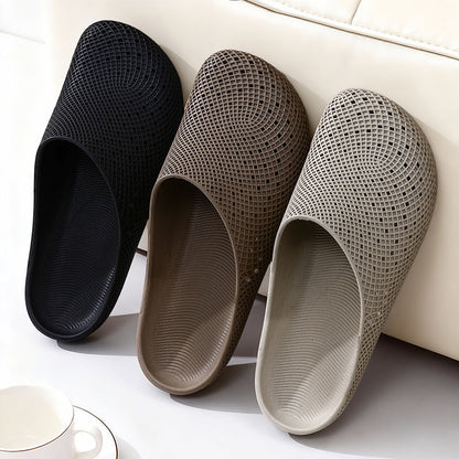 Unisex-tofflor i ventilerande nätmaterial