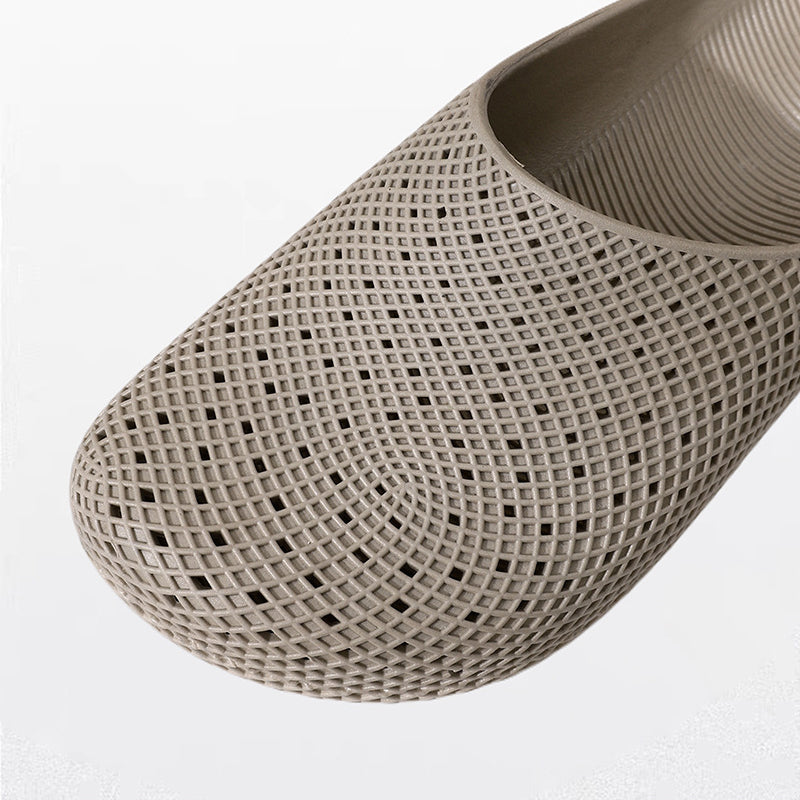 Unisex-tofflor i ventilerande nätmaterial