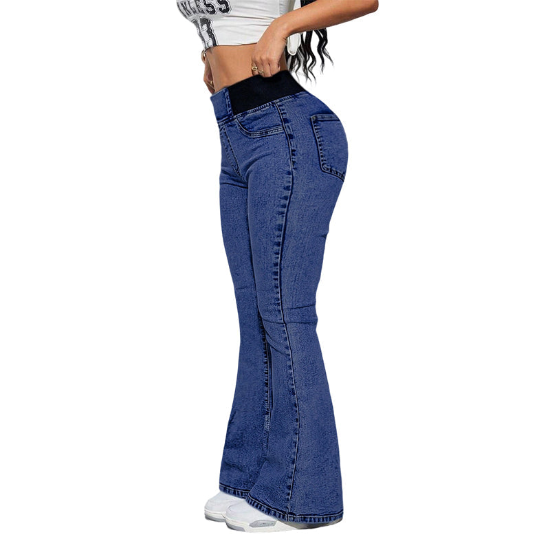 Elegant set med tvådelat set bestående av en linne med strass och utsvängda jeans