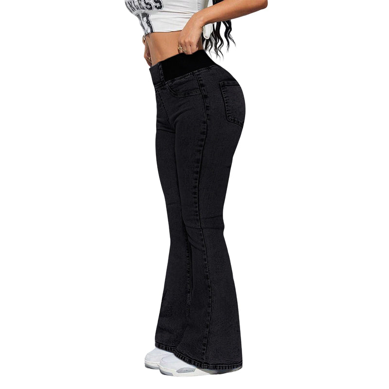 Elegant set med tvådelat set bestående av en linne med strass och utsvängda jeans