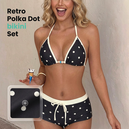Bikiniset med halterneck och prickmönster samt boxershorts