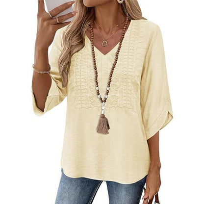 V-ringad, broderad fritidströja för damer