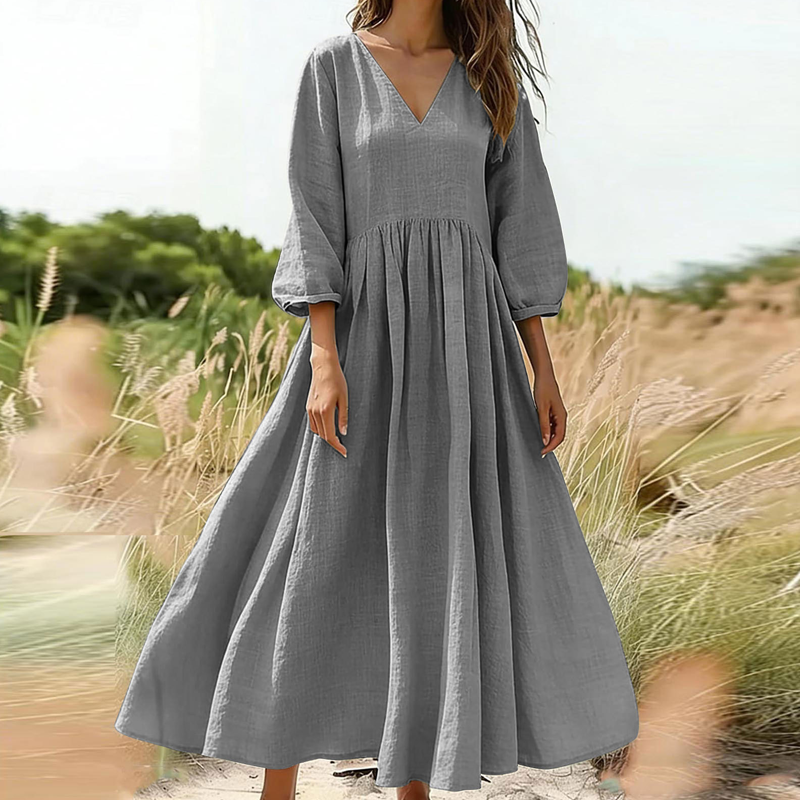 Trend just nu⭐ 👗 Elegant veckad långklänning med V-hals – perfekt för fest och vardag