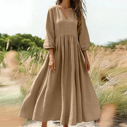 Trend just nu⭐ 👗 Elegant veckad långklänning med V-hals – perfekt för fest och vardag