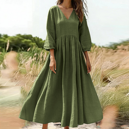Trend just nu⭐ 👗 Elegant veckad långklänning med V-hals – perfekt för fest och vardag